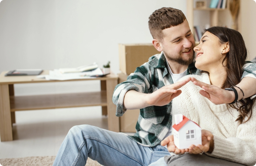 Couple with house